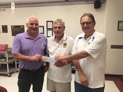 photo of check presentation by Mount Pleasant Lion's Club donation